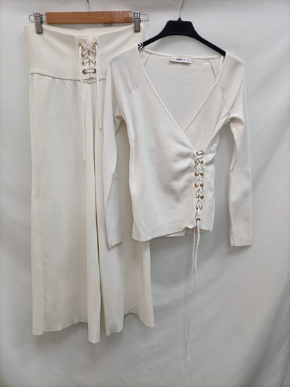 ZARA.Pantalones blancos punto T.s