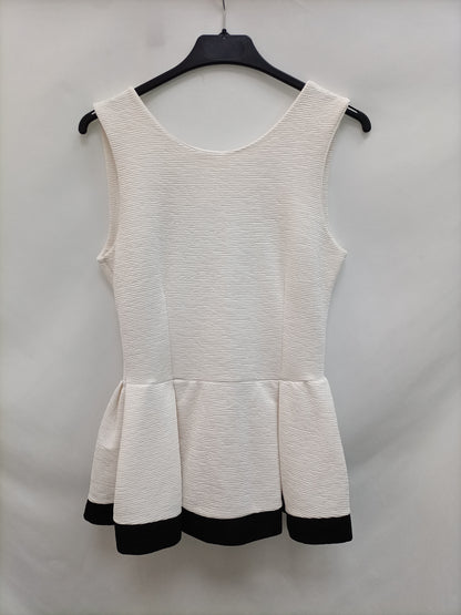 OTRAS.Top blanco volante TU(M)