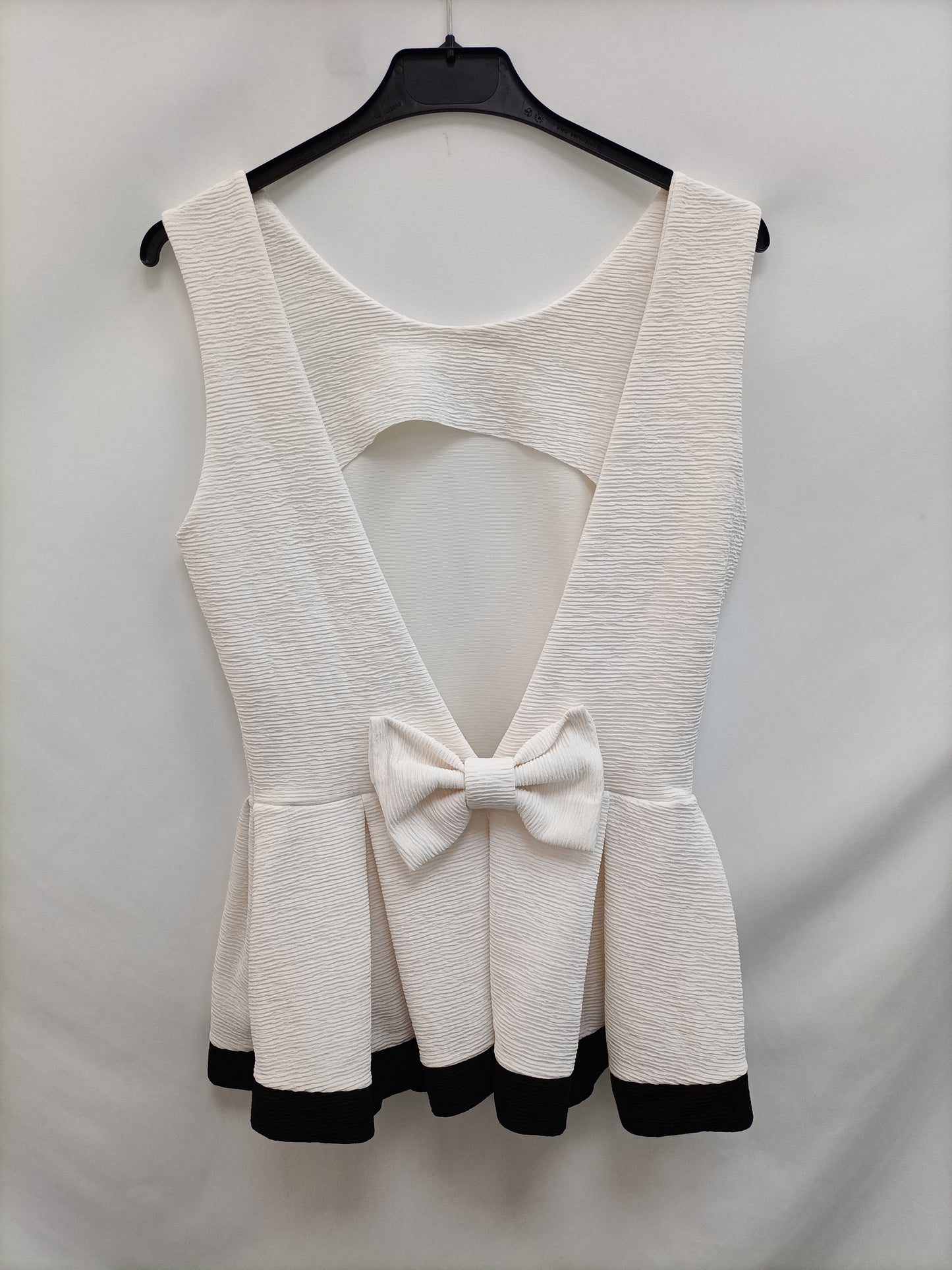 OTRAS.Top blanco volante TU(M)