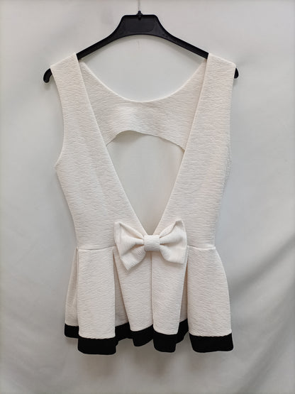 OTRAS.Top blanco volante TU(M)