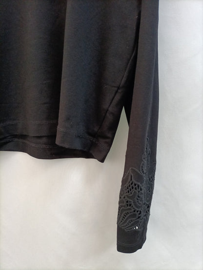 H&M. Sudadera negra encajes T.xs