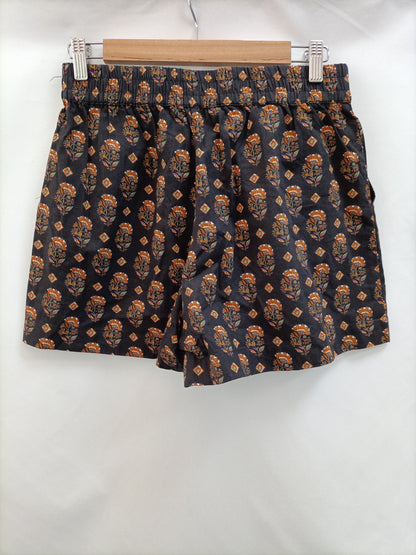 MANGO. Short marrón flores T.m