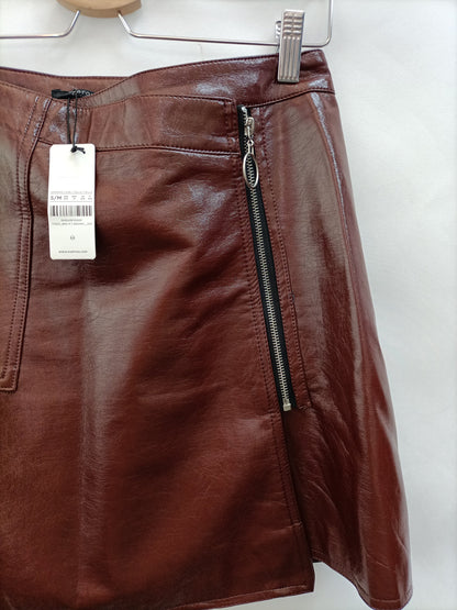 PARFOIS. Falda vinilo burdeos T.s/m