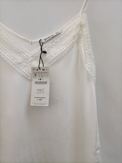 STRADIVARIUS. Top lencero blanco T.s