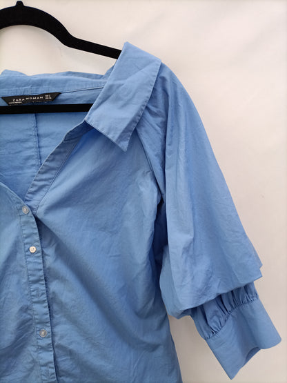 ZARA.Blusa azul mangas abullonadas T.s (tara)
