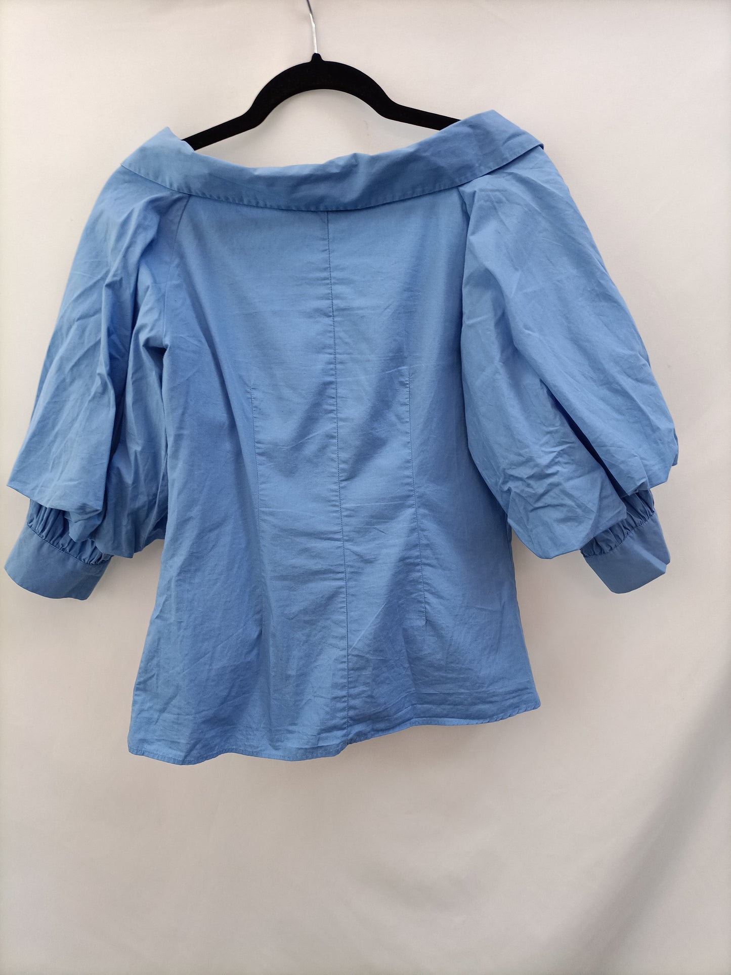 ZARA.Blusa azul mangas abullonadas T.s (tara)