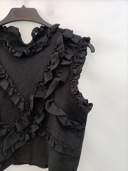 OTRAS.Top elástico ajustado volantes T.xs/s