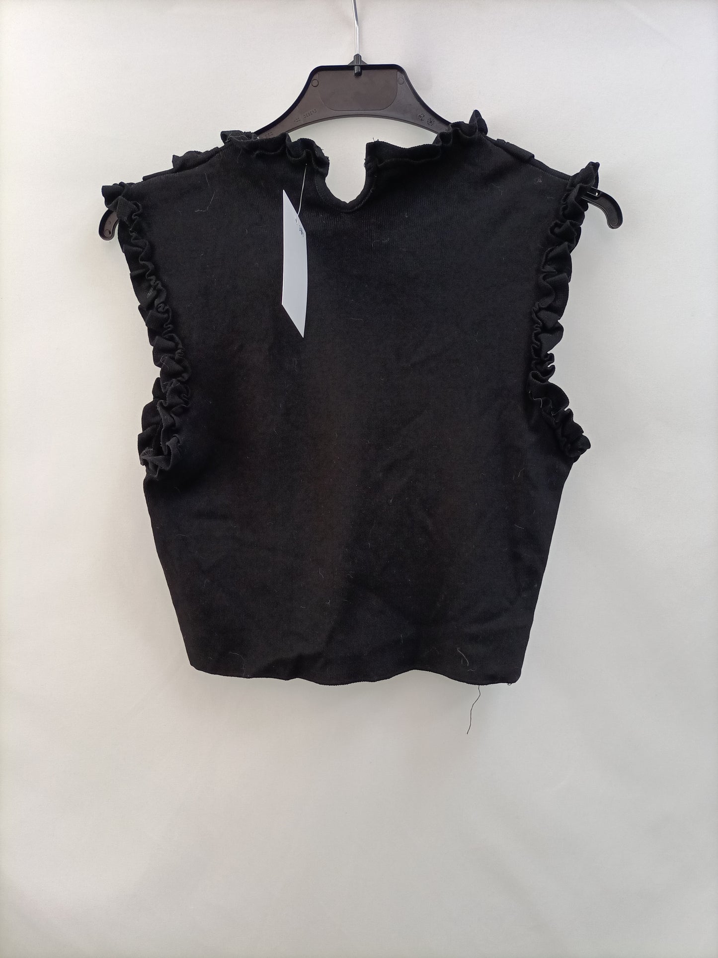 OTRAS.Top elástico ajustado volantes T.xs/s