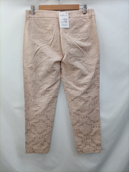 ZARA.Pantalones vestir bordados rositas T.m