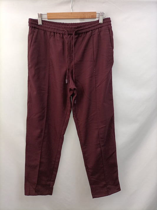 MANGO. Burgundy trousers Tm