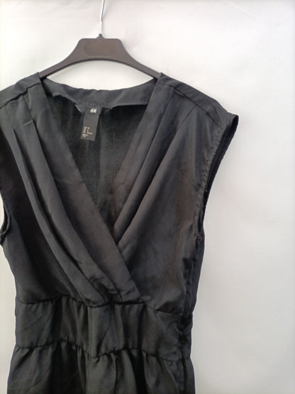 H&amp;M. Black satin jumpsuit size 34