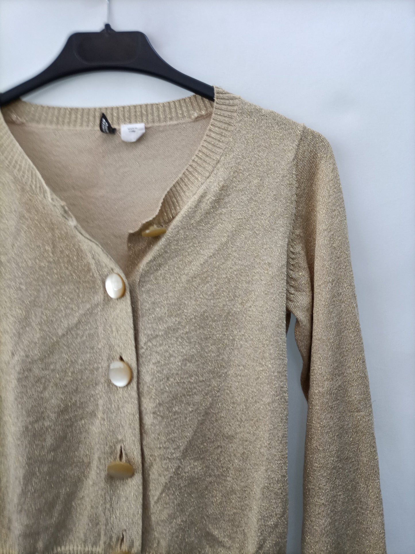 H&M. Rebeca dorada T.34