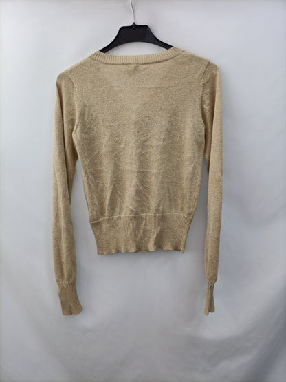 H&M. Rebeca dorada T.34