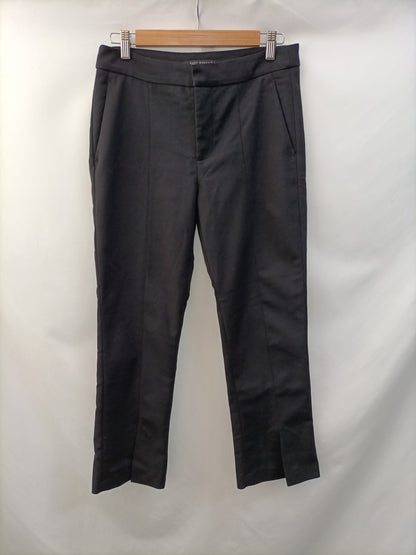 ZARA. Black pleated trousers with Ts openings