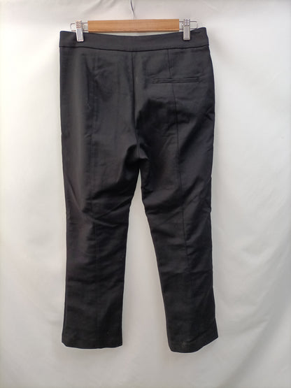 ZARA. Black pleated trousers with Ts openings