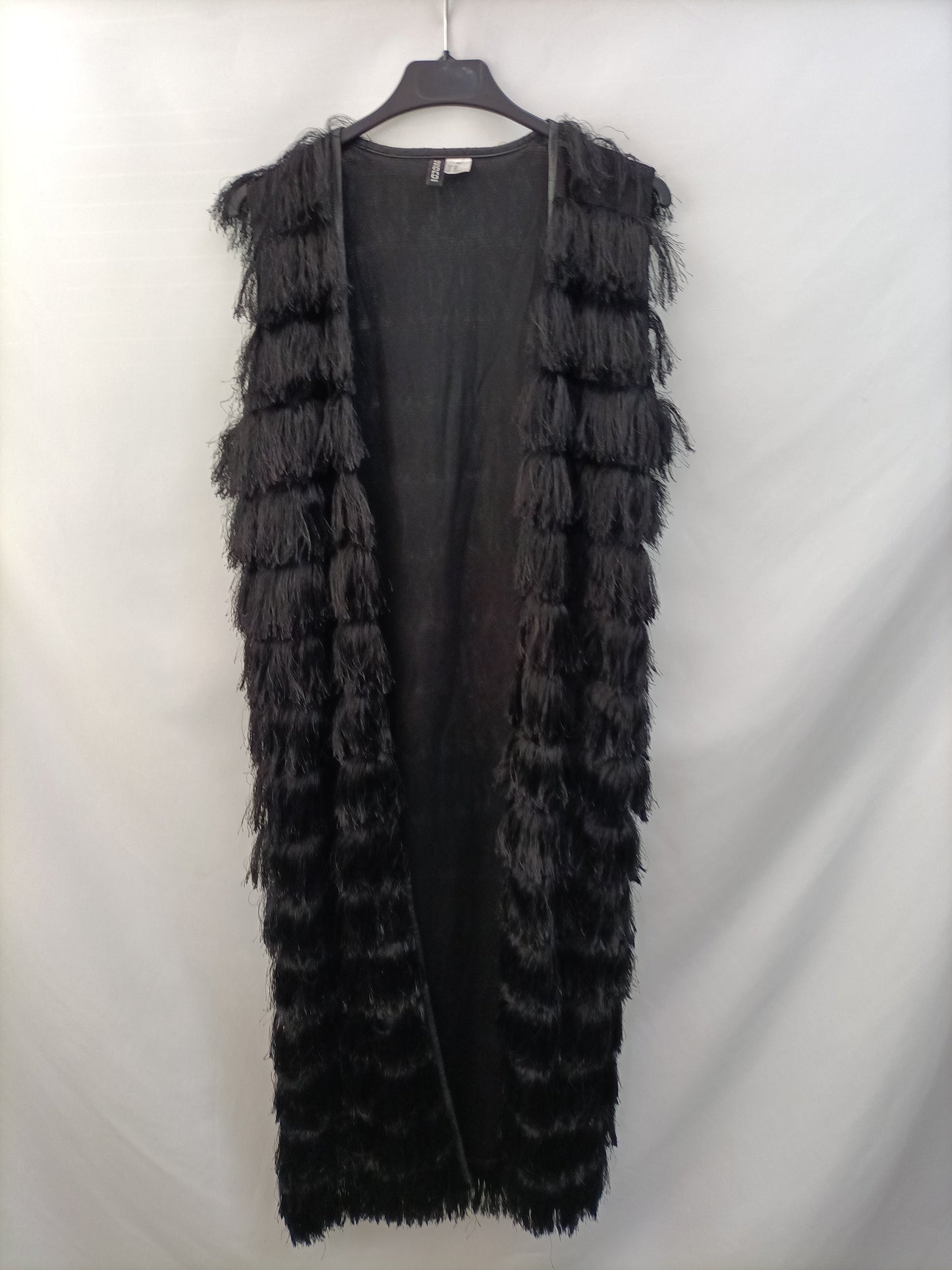 H&M.Chaleco largo flecos T.XS (tara)