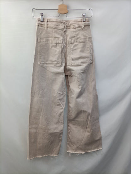 ZARA.Pantalones beiges acampanados T.36
