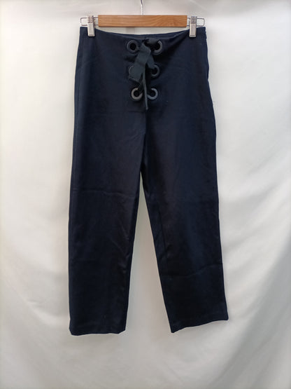 ZARA.Pantalones azules lazos T.s