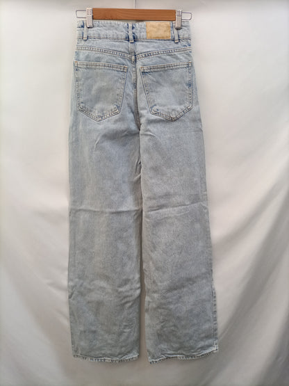 ZARA.Pantalones campana T.34