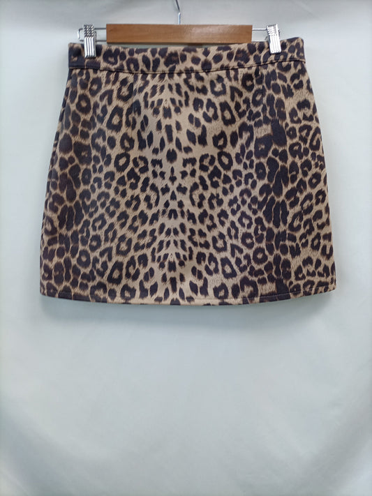 OTRAS.Falda corta animal print T.XL