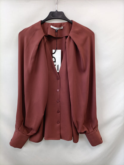 ADOLFO DOMÍNGUEZ.Blusa burdeos T.38