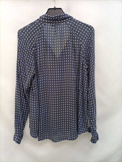 MASSIMO DUTTI. Blusa estampada T.s