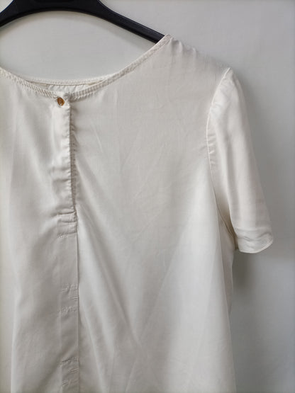 OTHERS. Beige top with back Your(s)