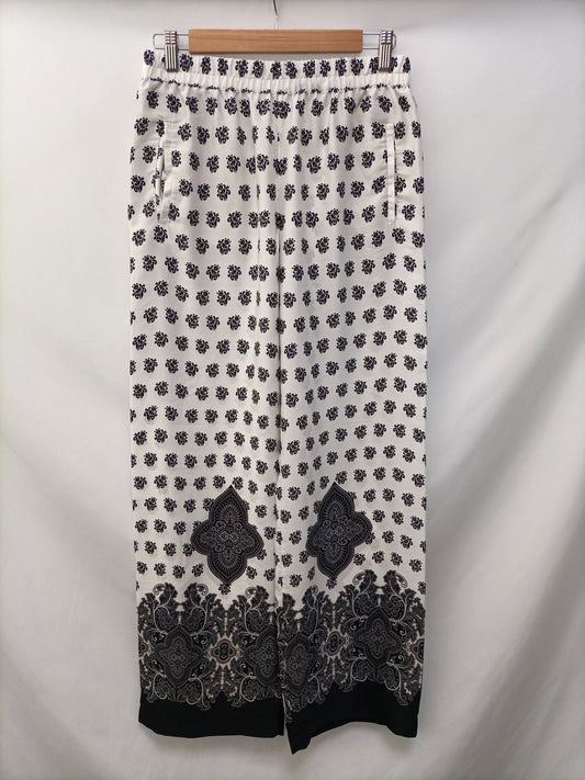 ZARA. Floral palazzo pants Ts