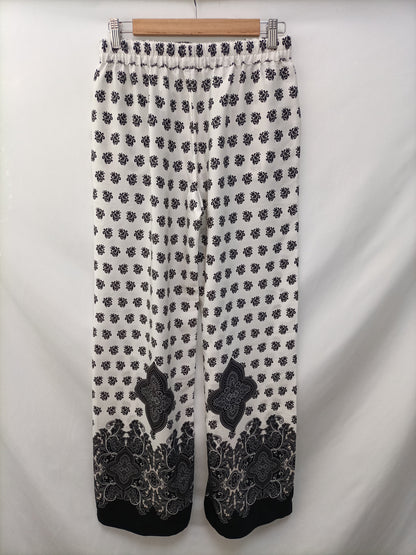 ZARA. Floral palazzo pants Ts