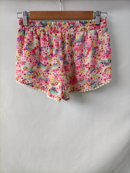 BERSHKA. Shorts flores T.m