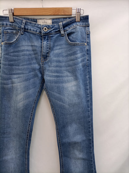 LOVE AND MONEY.Pantalones denim campana T.xl