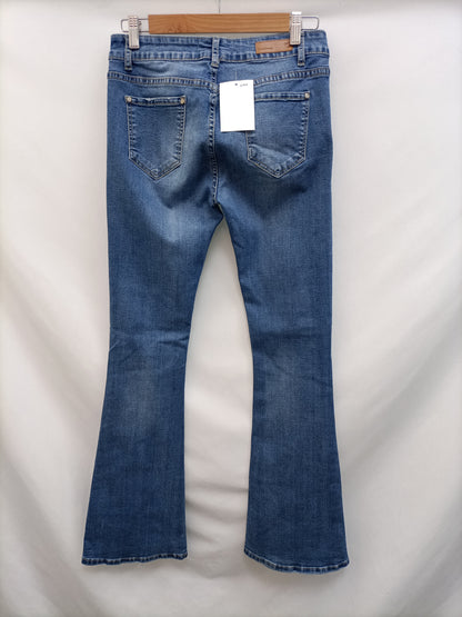 LOVE AND MONEY.Pantalones denim campana T.xl