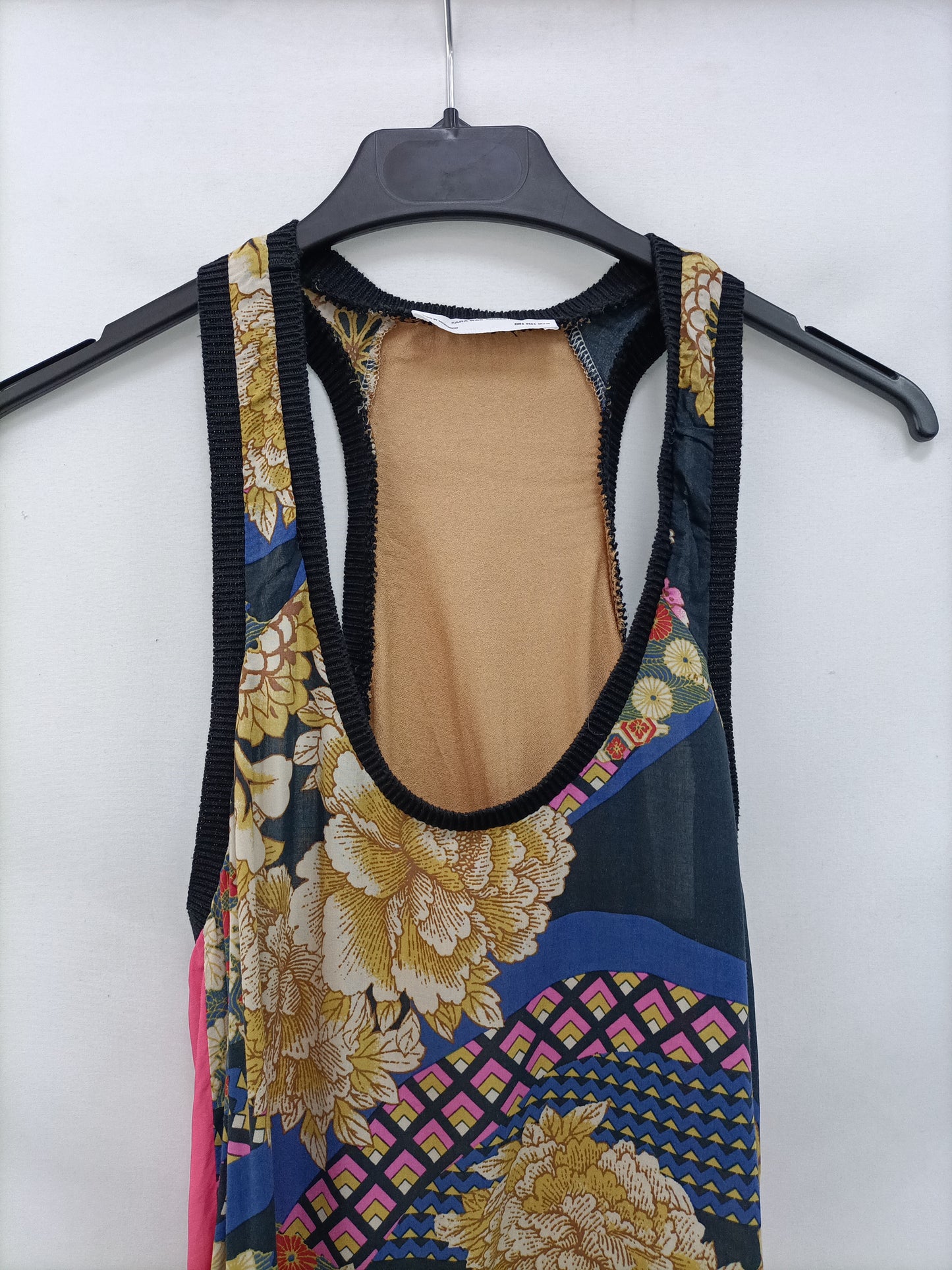 ZARA. Double-textured top with a beige print.