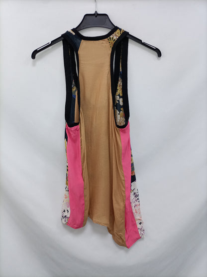 ZARA. Double-textured top with a beige print.