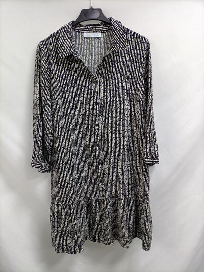 PRIMARK. Vestido corto negro y blanco T.42