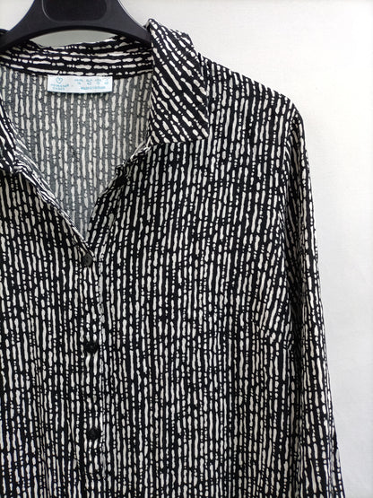 PRIMARK. Vestido corto negro y blanco T.42