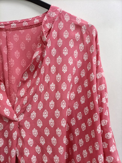 OTRAS. Blusón rosa flores Tu(m)