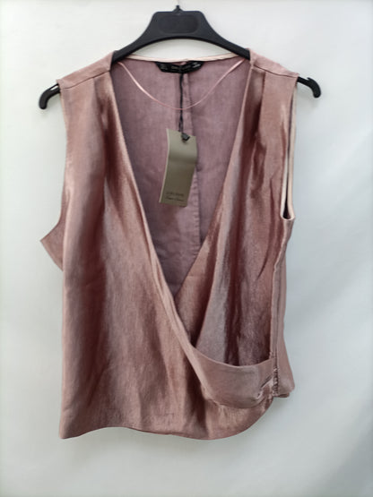 ZARA.Top rosa brillo T.L