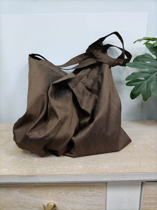 OTRAS. Bolso marrón saco