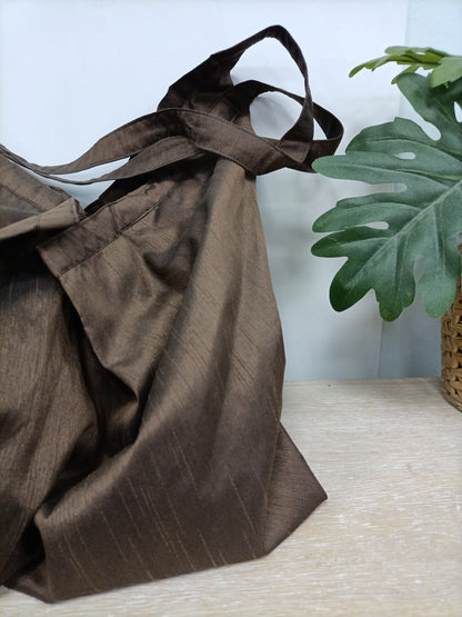 OTRAS. Bolso marrón saco