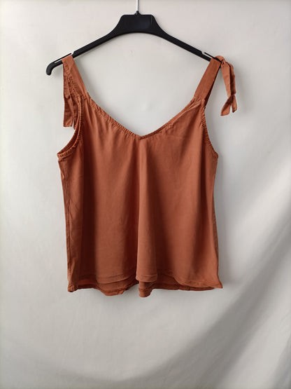 OTRAS. Top naranja Tu(s)