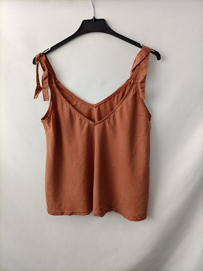 OTRAS. Top naranja Tu(s)