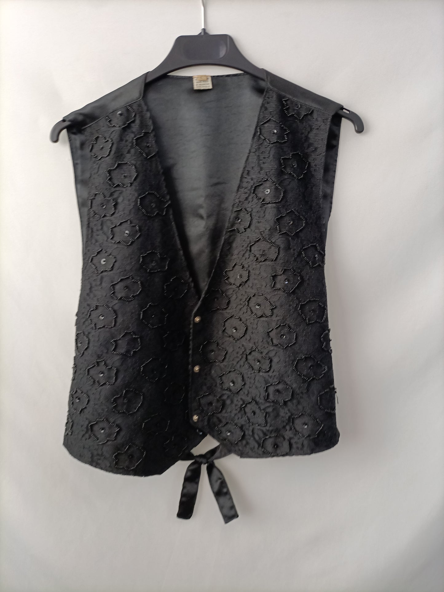 OTRAS. Chaleco negro pedrería T.l