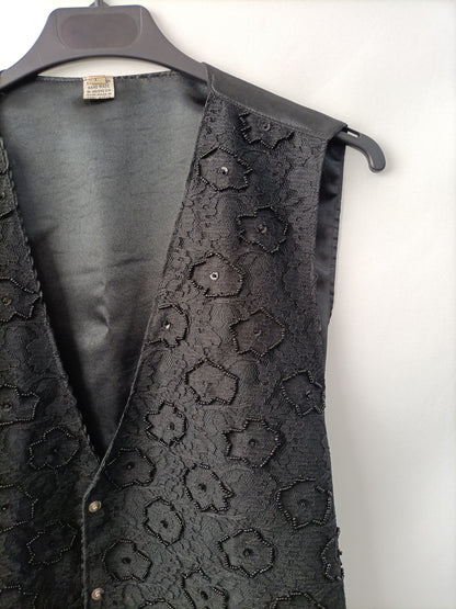 OTRAS. Chaleco negro pedrería T.l
