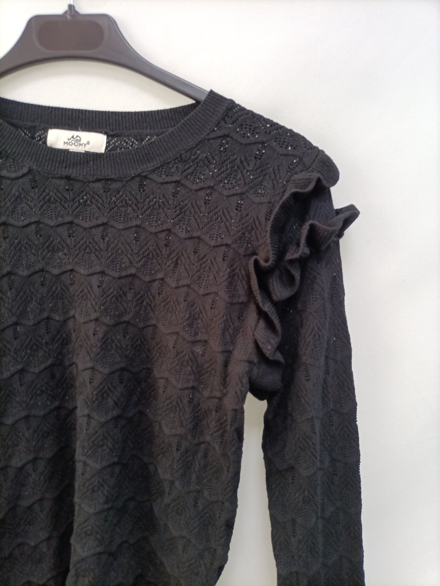 MOCHY. Jersey negro troquelado T.u