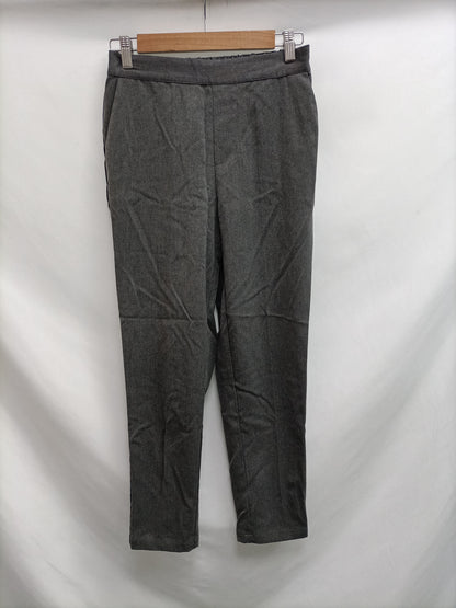SPRINGFIELD. Flowy grey trousers size 34