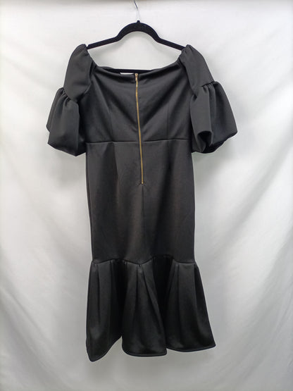 BOOHOO. Black dress with ruffles, size 40