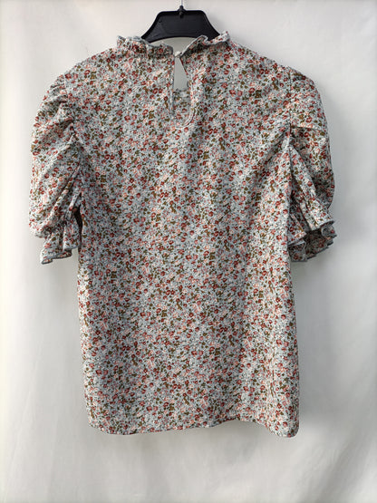 OTRAS. Blusa azul flores T.u(s)