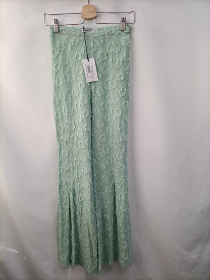 SHOPIE AND LUCIE. Textured trousers S.34