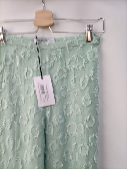 SHOPIE AND LUCIE. Textured trousers S.34